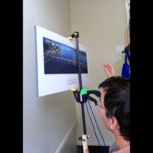 Hanging a picture out of reach with a clamp #shorts