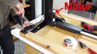 Standing desk using a motorized frame