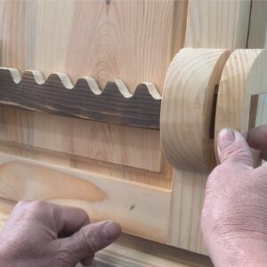 The Wooden Cabinet Has A Gear Opening And Closing Mechanism And A Unique Hidden Storage Compartment