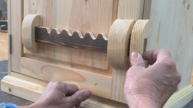 The Wooden Cabinet Has A Gear Opening And Closing Mechanism And A Unique Hidden Storage Compartment