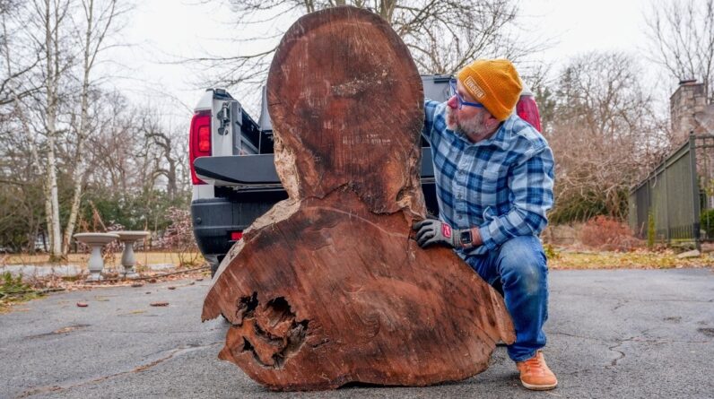 Turning this massive chunk of walnut into a lamp sculpture.